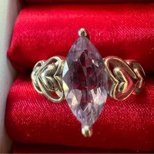 Elegant 925 Sterling Silver and genuine Amethyst heart ring.
